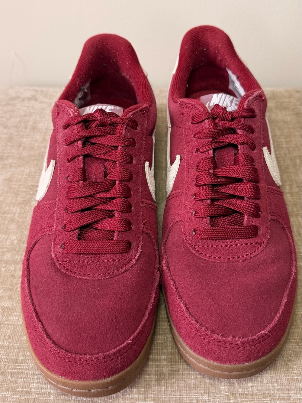 Nike Women’s Burgundy Suede Sneakers with White Swoosh and Gum Sole